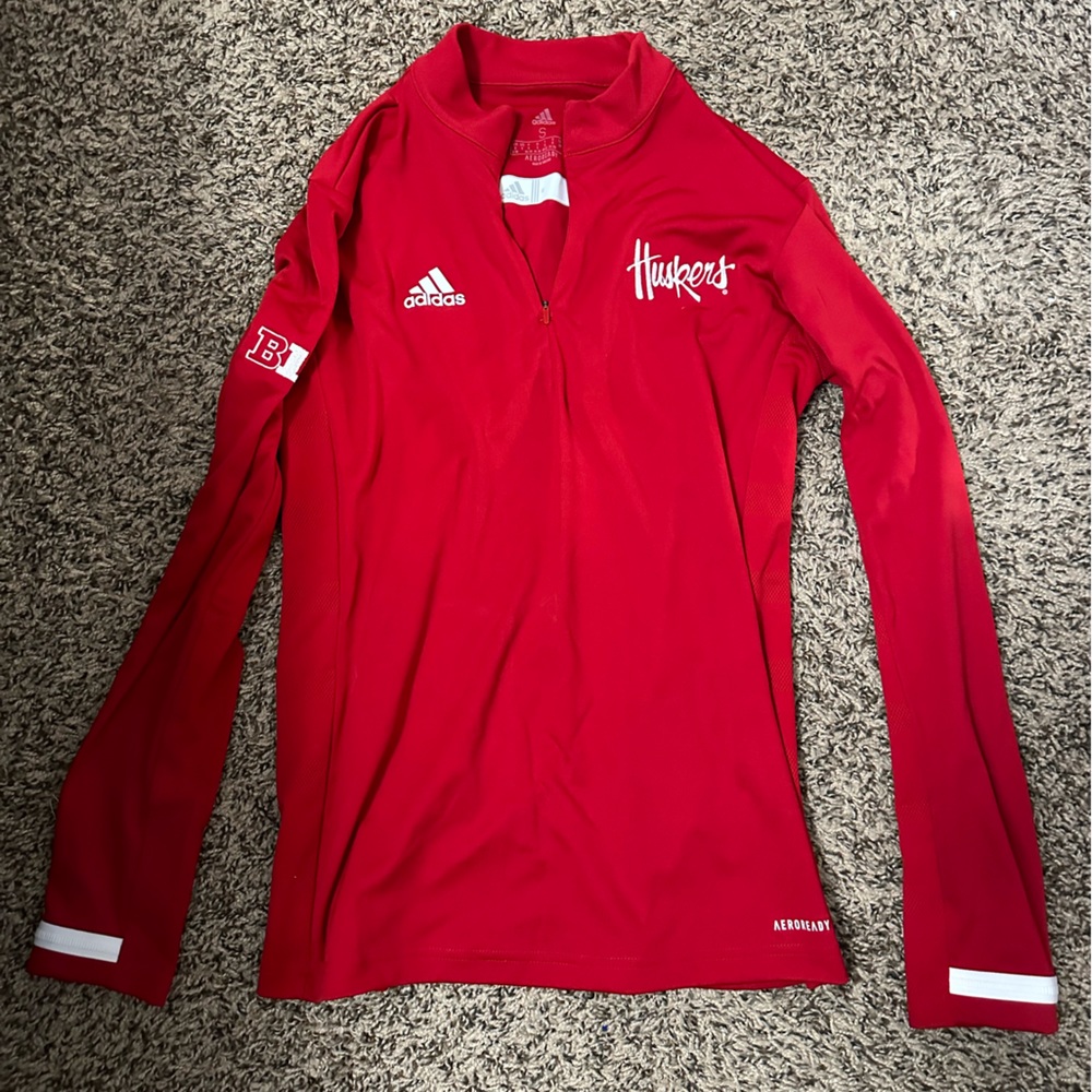 red quarter zip